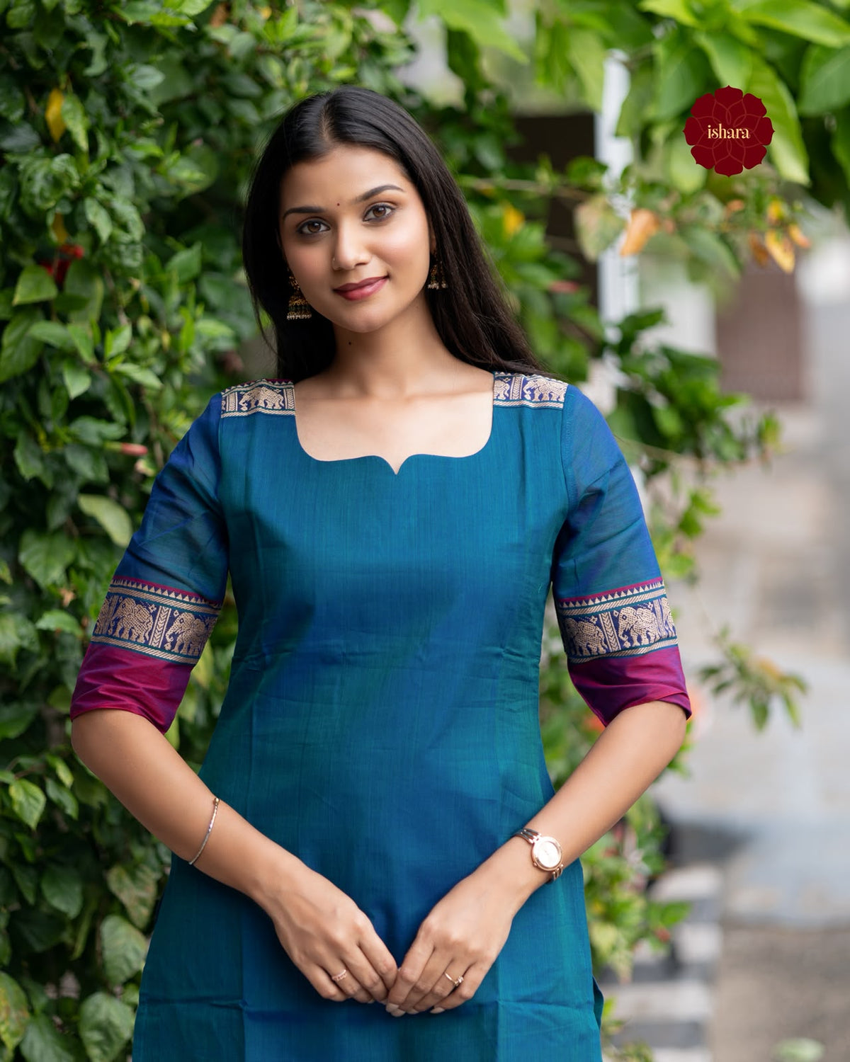 teal blue kurta with purple sleeves